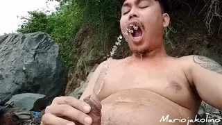 Asian Mature Man Strokes His Big Cock and Pisses