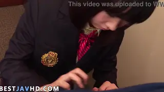Japanese Schoolgirl in Uniform Delivers a Deep Blowjob at a Desk