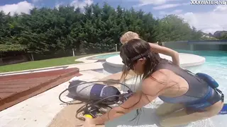 Brunette Lesbians Piss and Lick Poolside