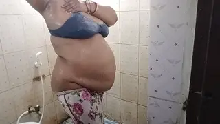 Busty Indian MILF Shows Off in a Wet Shower Solo