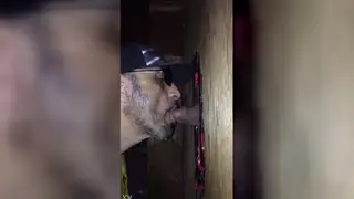 Stranger Drains Cock Through Gloryhole in Club