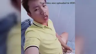 Asian Office Worker Gives Quick Bathroom Blowjob