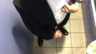 Suited Man Strips Down in Sleek Uniform