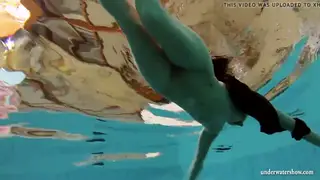 Teen in Sheer Dress Moves Underwater