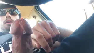 Muscular Hunk Strokes Big Cock in Car
