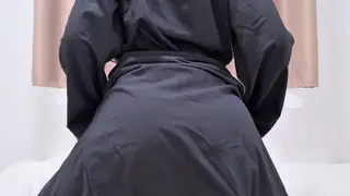 Petite Asian Woman Teases in a Black Hijab for POV