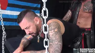 Tattooed Muscle Hunk Takes Bareback Pounding in Leather