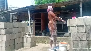 Voluptuous Ebony Bathes Nude in an Outdoor Shower
