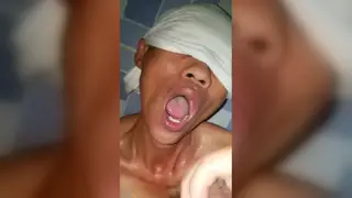 Amateur Guy Kneels for a Blowjob in Dim Light