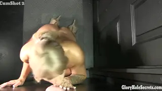 Busty Woman Services Multiple Cocks Through Gloryhole