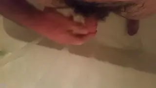 Lone Guy Pumps His Meat Under the Spray
