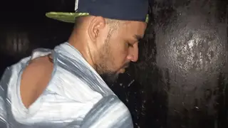 Three Latino Men Share Gloryhole Fun in Dark Cinema