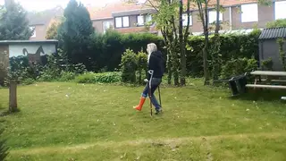 Blonde European Walks Garden on Crutches Then Smokes