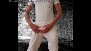 Solo Guy Performs Slow Striptease for the Camera