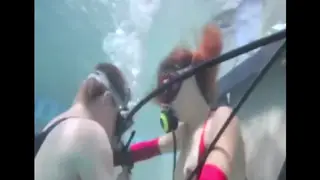 Brunette MILF Dominates in Bondage Beneath the Pool Surface