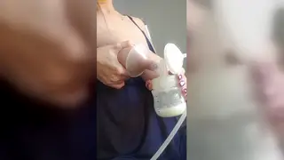 Pregnant Latina Milks Her Heavy Breasts