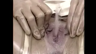 Busty Compilation Showcases Golden Shower Fetish in Latex