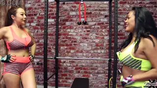 Fit Lesbians Mix Gym Workout With Dildo Play and Piss