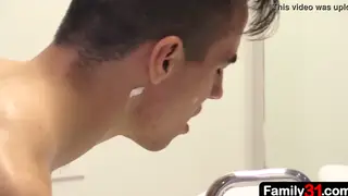 Inked Stepdad Guides Stepson Through First Bathroom Penetration