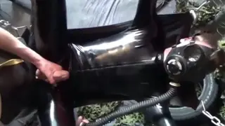 Latex-Clad Men Explore Toys on a Sling