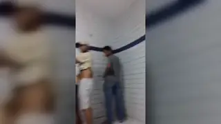 Amateur Performs Solo in Outdoor Bathroom
