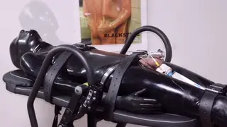 Bound in Latex for Electro Handjob and Cumshot