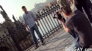 Muscular Studs Share a Blowjob Under Open Sky