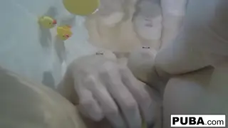 Busty Blonde Plays With Herself in a Bubble Bath