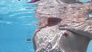 Tattooed European Teen Swims Nude in Outdoor Pool