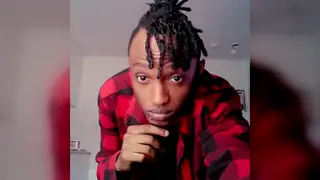 Ebony Hunk Flexes His Sculpted Physique on Camera