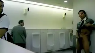 Amateur Exhibitionist Shows Off in Public Restroom