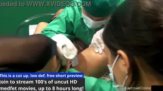 Bound Brunette Endures Toy Torment on Exam Table