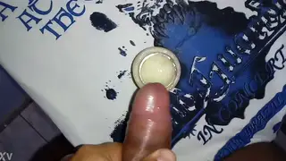 Guy Collects Frozen Cum Shots in Fetish Clip
