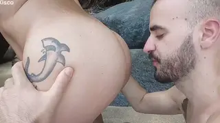 Latino Pair Explores Each Other on a Public Beach