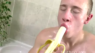 Blonde Twink Strokes an Uncut Cock in a Steamy Bathroom