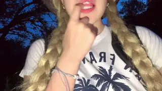 Blonde Student Explores Her Curves in a Forest Clearing