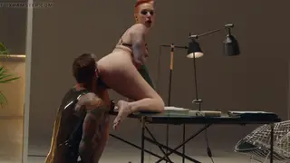 Redhead in Latex Submits to Hard Doggystyle Pounding