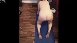 Voluptuous MILF Stretches Nude for Yoga Handjob