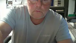 Chubby European Bear Strokes Huge Cock at Desk