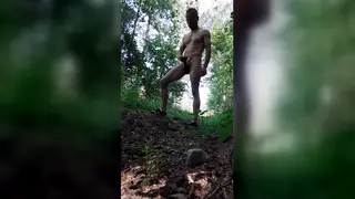 Mature Tourist Plays With Toys Outdoors on Holiday
