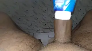 Solo Guy Slides His Cock Into a Bottle