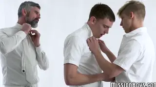 Uniformed Teacher and Student Share Twink in Classroom Threesome