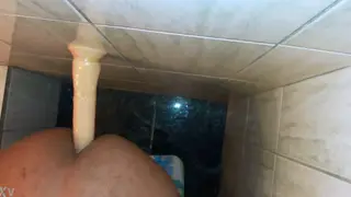 Latino Enjoys Solo Toy Play in Steamy Shower