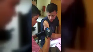 Inked Artist Sucks Client's Cock in the Studio Chair