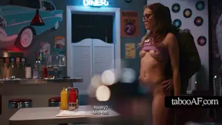 Uniformed Waitress Serves Her Partner While He Watches Closely