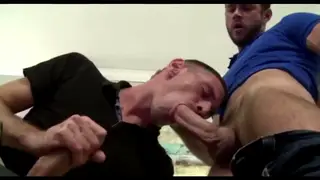 Two Guys Share a Cock While a Third Watches