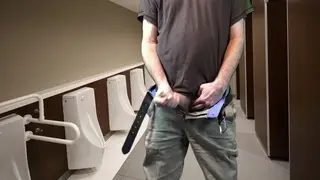 Mature Daddy Strokes Uncut Cock in Public Bathroom