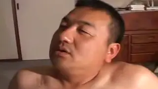 Japanese Daddy Feeds Cock to Chubby Partner