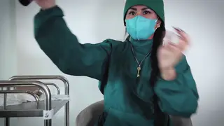 Solo Nurse in Latex Gloves Teases in Uniform