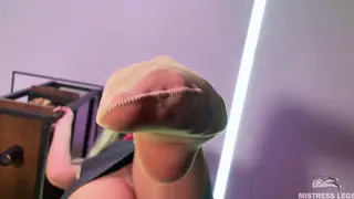 Dominant Woman Presses Nylon Soles to the Lens